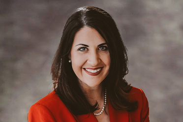 Headshot of Adrienne Woods, Esq., Attorney at Stuart Cearley Law Group