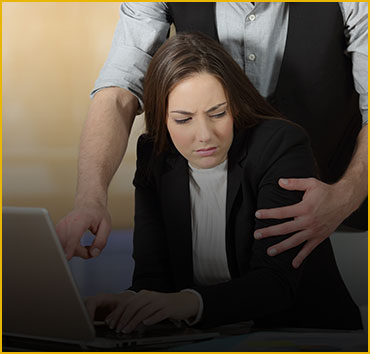 Person comforting someone distressed by a laptop: Sexual assault & rape.