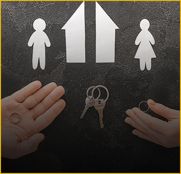 Paper figures of family, wedding rings, keys: Symbolizing annulment.