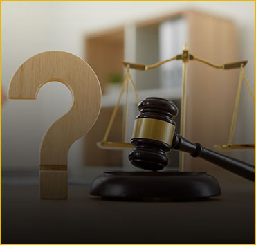 Question mark and gavel: Representing legal FAQs.