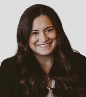 Professional headshot of Associate Attorney Eden Kinard in a dark blazer.